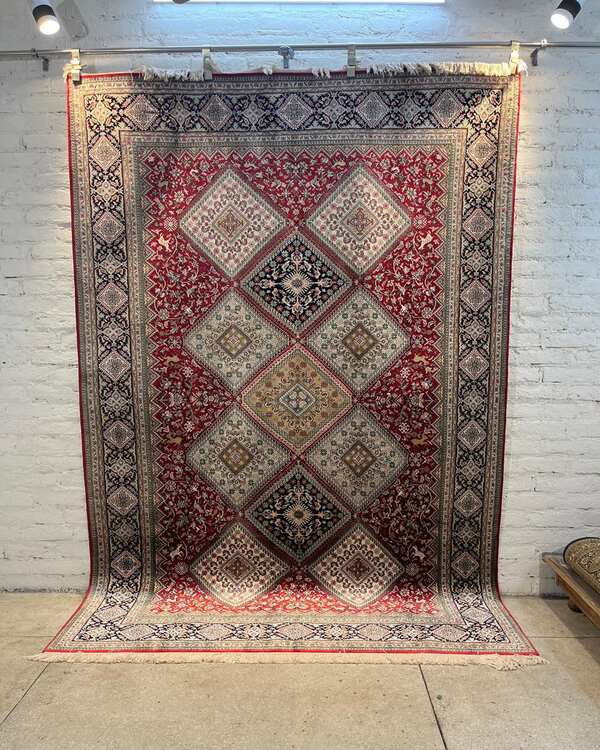 Prestigious old remi oriental rug in size 6x9 feet in black red colour